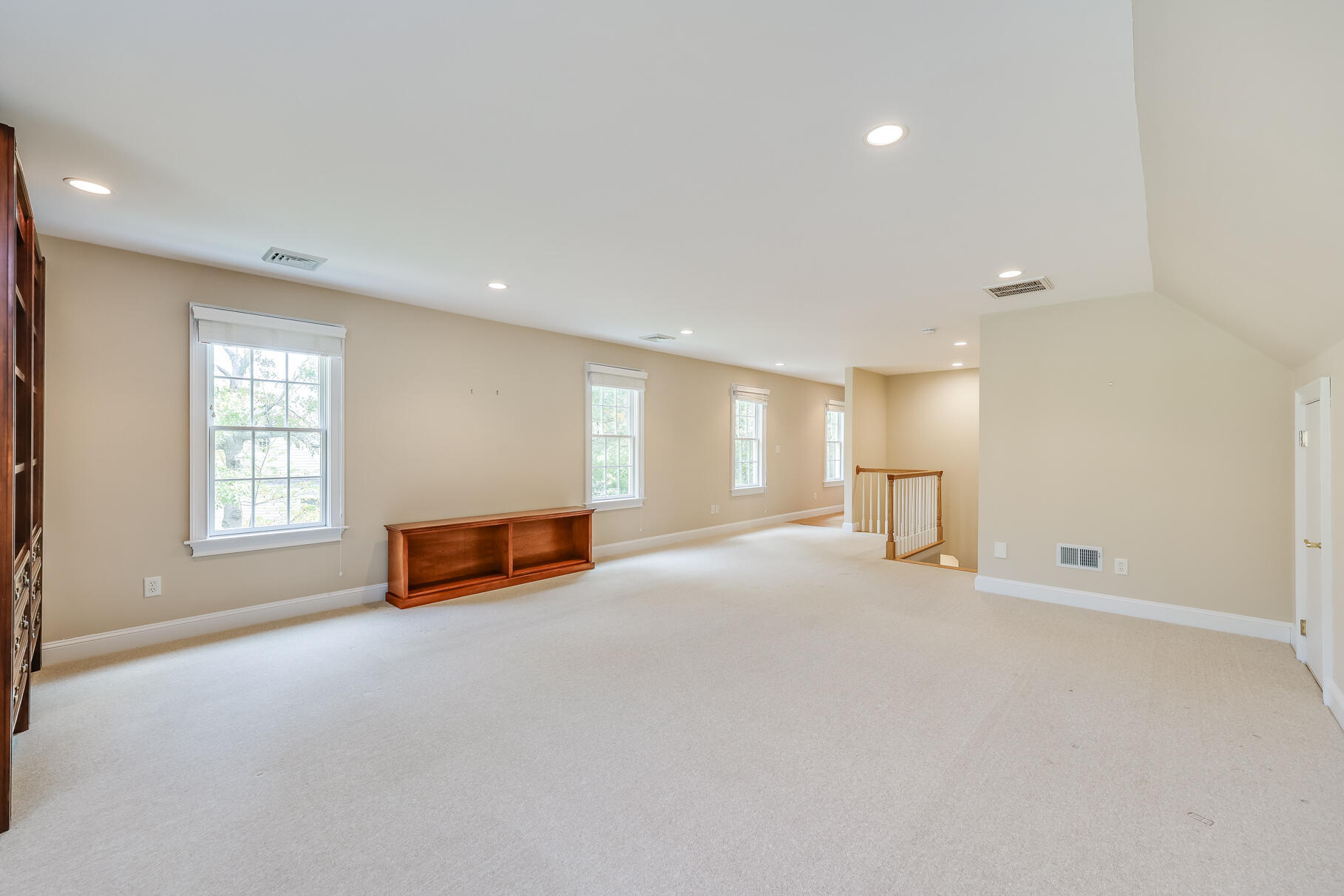 29 Reflection Drive Sandwich, MA 02563 - Photo 42 of 51 an empty room with windows and pillars in it