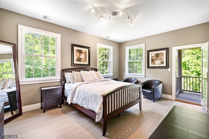 2 Chilton Road Chester, NJ 07930 - Photo 12 of 43 a bedroom with a bed chair and a window