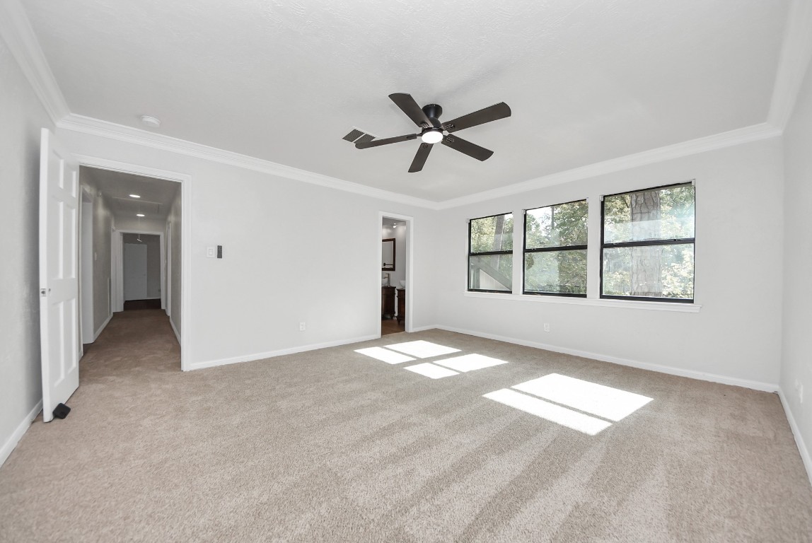 8111 Oak Moss Drive Spring, TX 77379 - Photo 30 of 49 a view of an empty room with a window