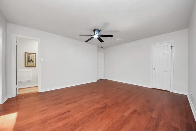 a view of a big room with carpet