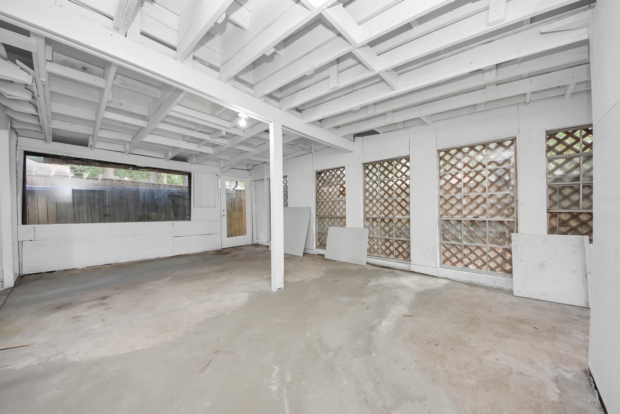 8111 Oak Moss Drive Spring, TX 77379 - Photo 44 of 49 a view of an empty room with a window