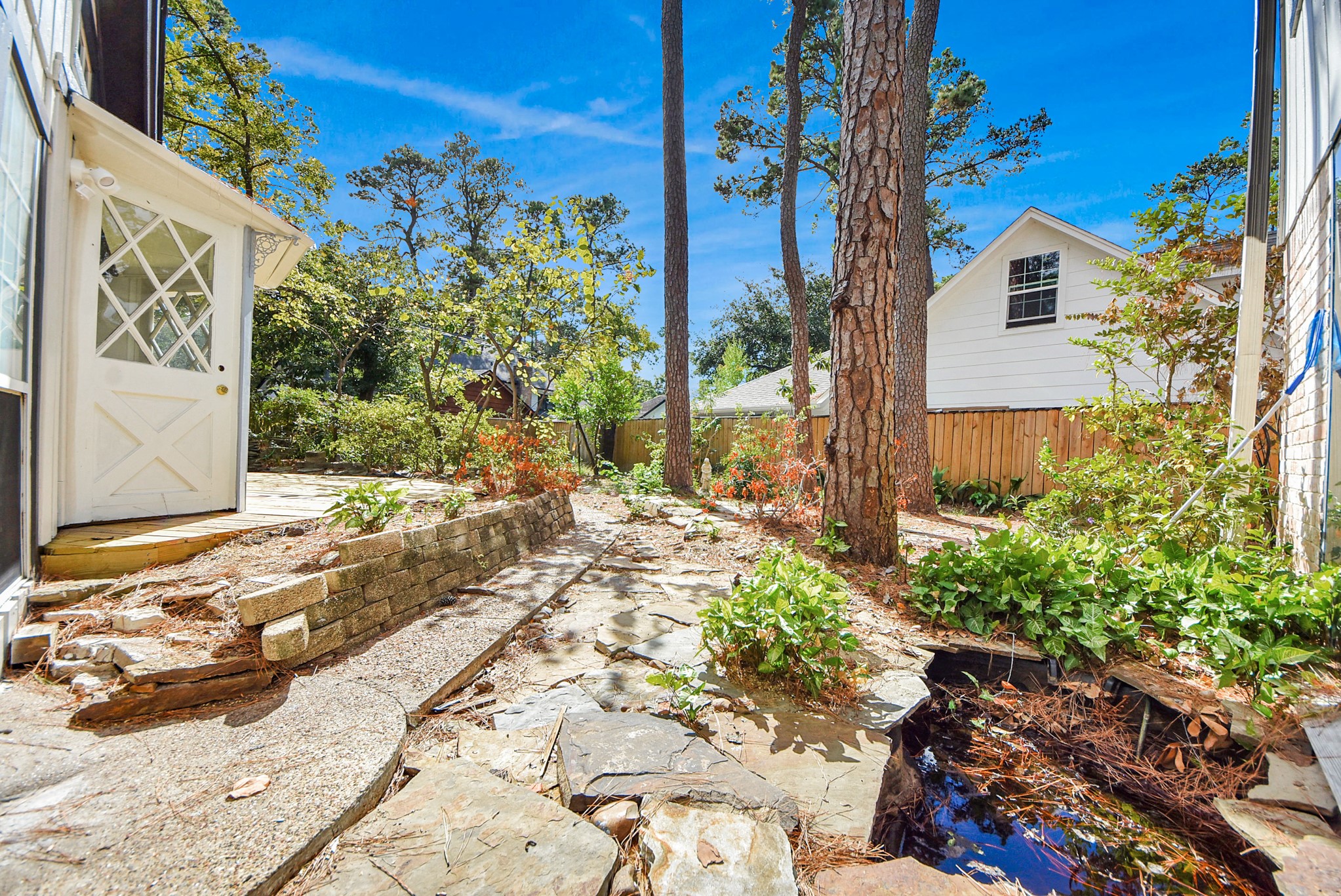 8111 Oak Moss Drive Spring, TX 77379 - Photo 49 of 49 a view of a house with a yard