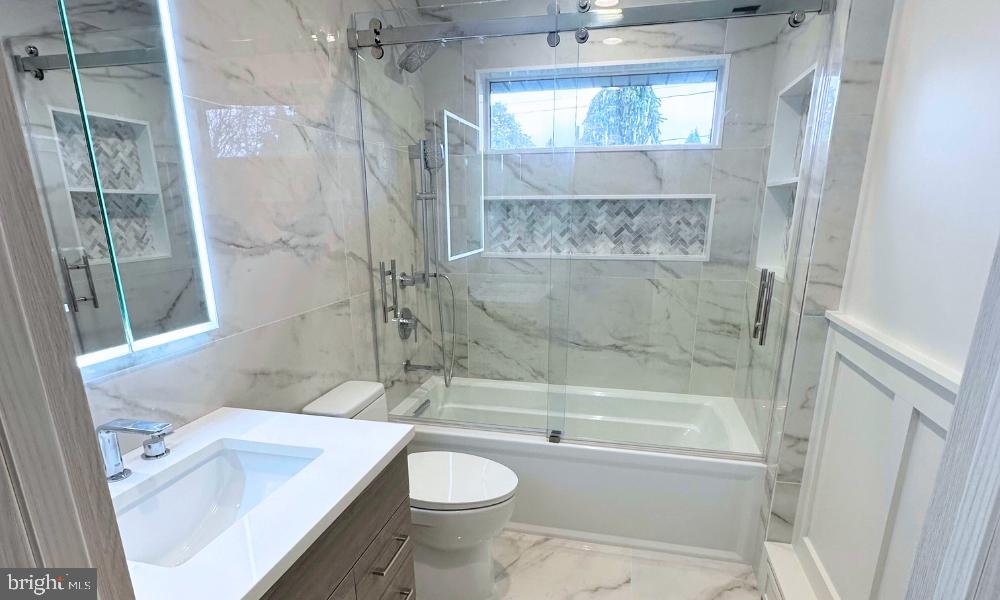476 Riverside Avenue Trenton, NJ 08618 - Photo 6 of 9 a bathroom with a sink toilet and shower