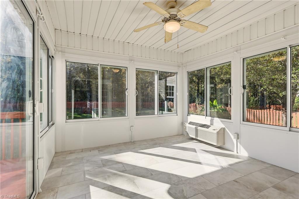 2166 Glen Cove Way High Point, NC 27265 - Photo 20 of 41 Enclosed sunroom overlooking the spacious back yard