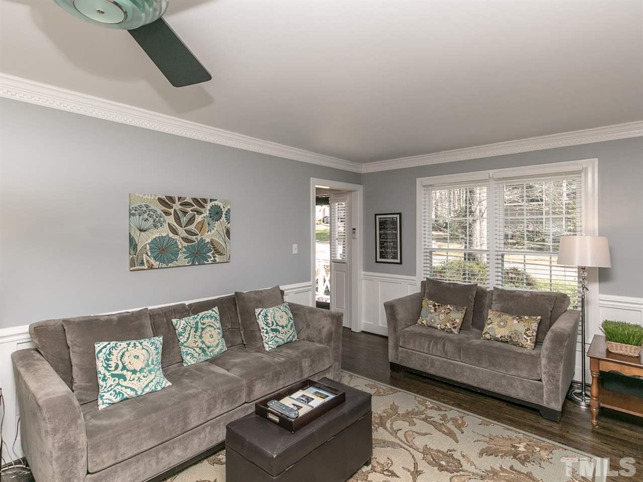 8601 Canoe Court Raleigh, NC 27615 - Photo 5 of 25 Beautiful refinished hardwoods throughout downstairs living area.