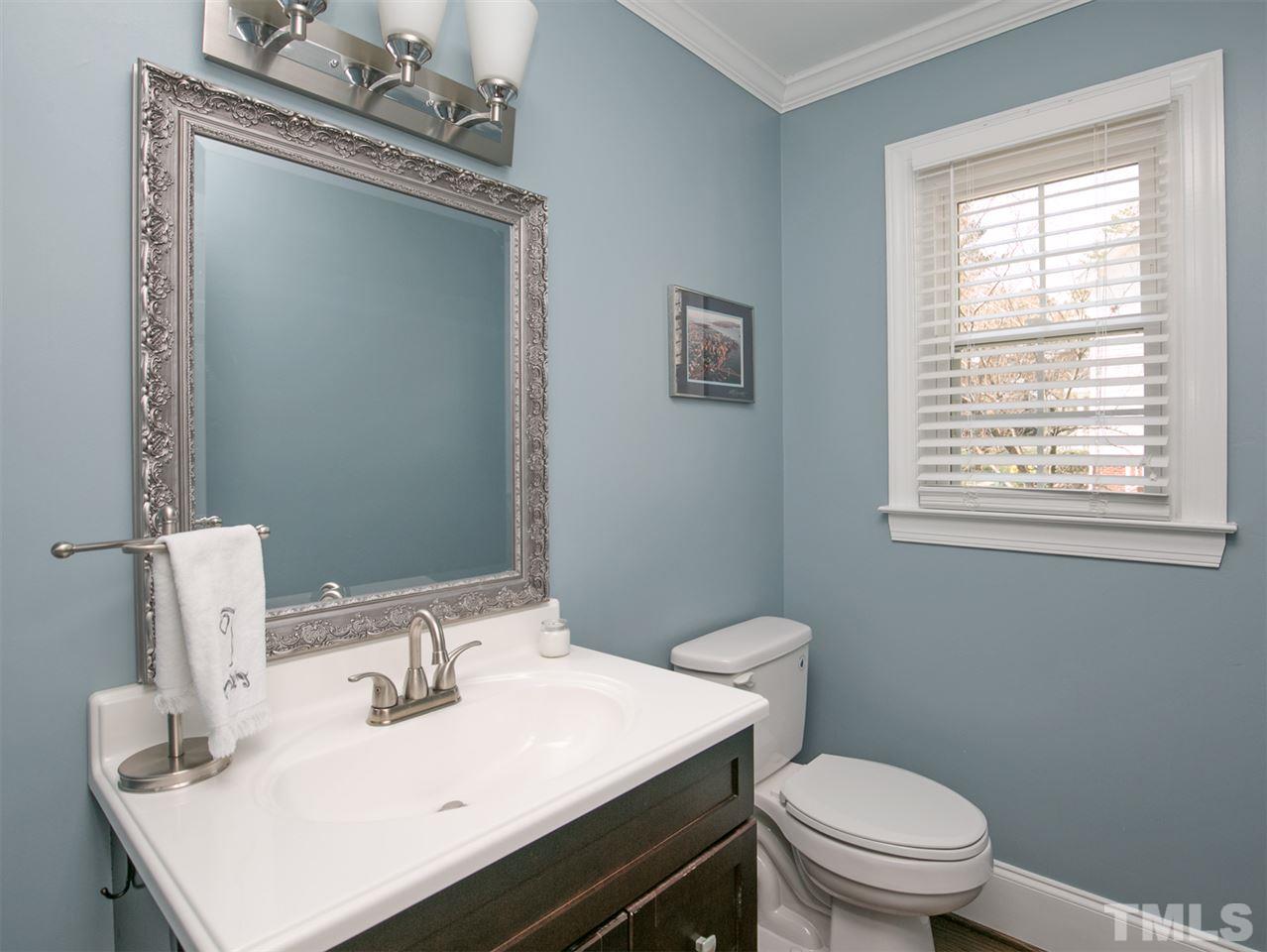 8601 Canoe Court Raleigh, NC 27615 - Photo 6 of 25 beautiful remodeled powder room.