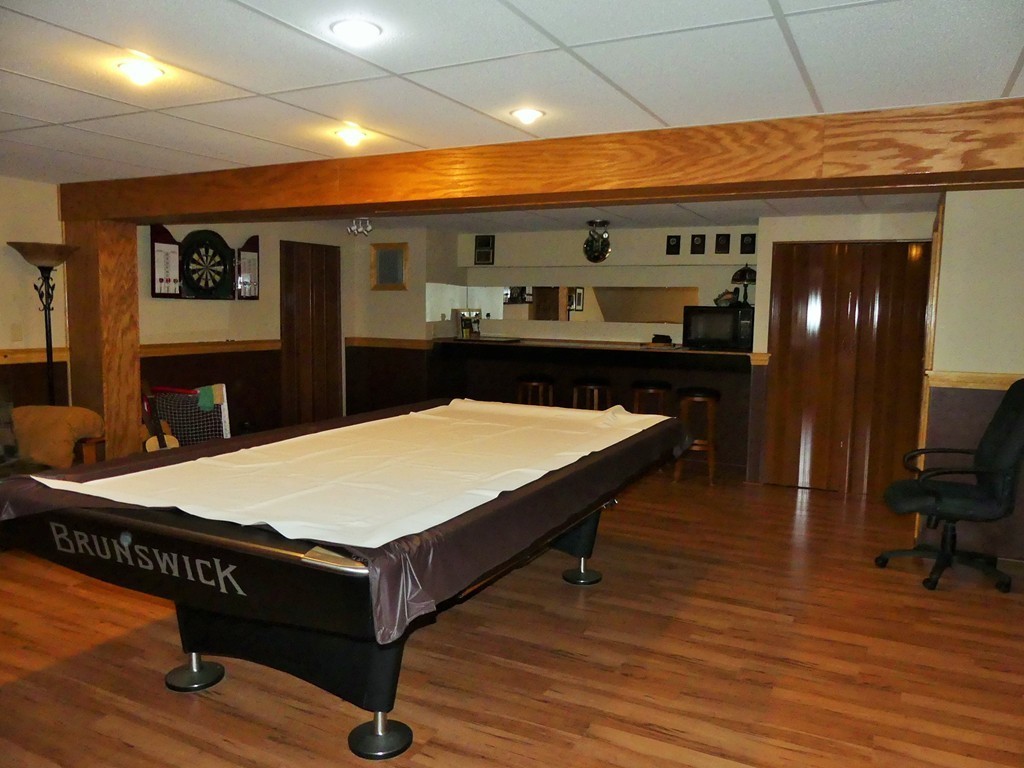 159 Cook Road Templeton, MA 01468 - Photo 23 of 25 a room with wooden floor pool table and windows