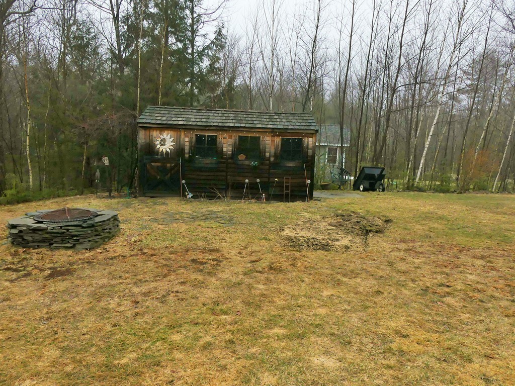 159 Cook Road Templeton, MA 01468 - Photo 5 of 25 a view of a yard with wooden fence