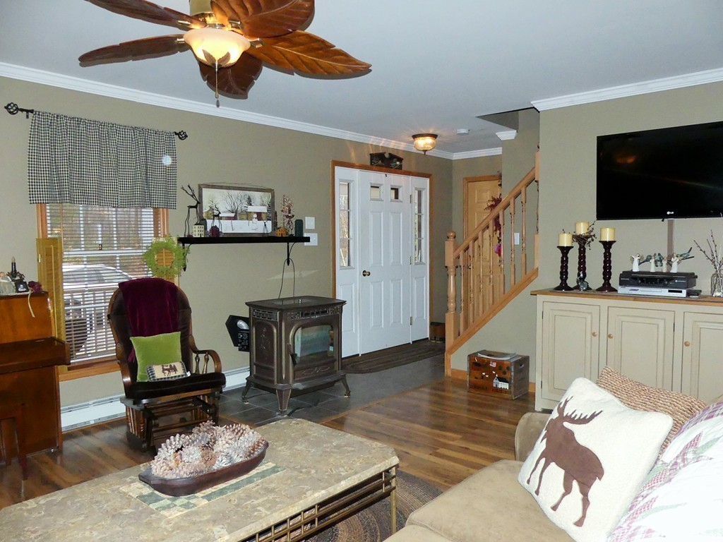 159 Cook Road Templeton, MA 01468 - Photo 8 of 25 a living room with furniture and a flat screen tv