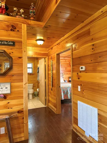 a view of an entryway and livingroom