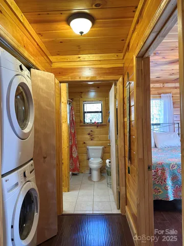 a view of a hallway with washer and dryer