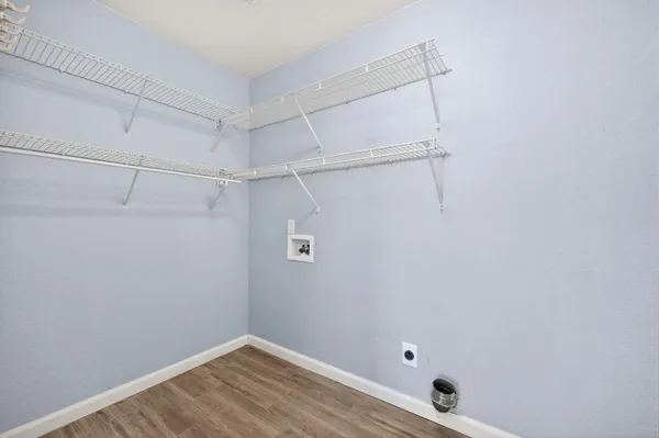 a view of a room with racks on the wall