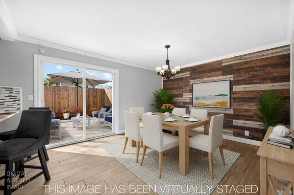 a view of a dining room with furniture