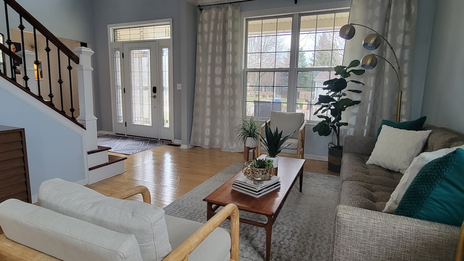 3907 Farmstead Road Carpentersville, IL 60110 - Photo 11 of 49 a living room with furniture and a large window