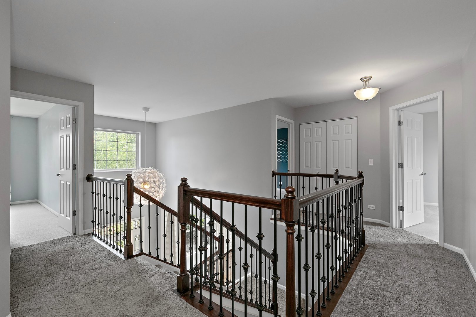 3907 Farmstead Road Carpentersville, IL 60110 - Photo 29 of 49 a view of a hallway with windows