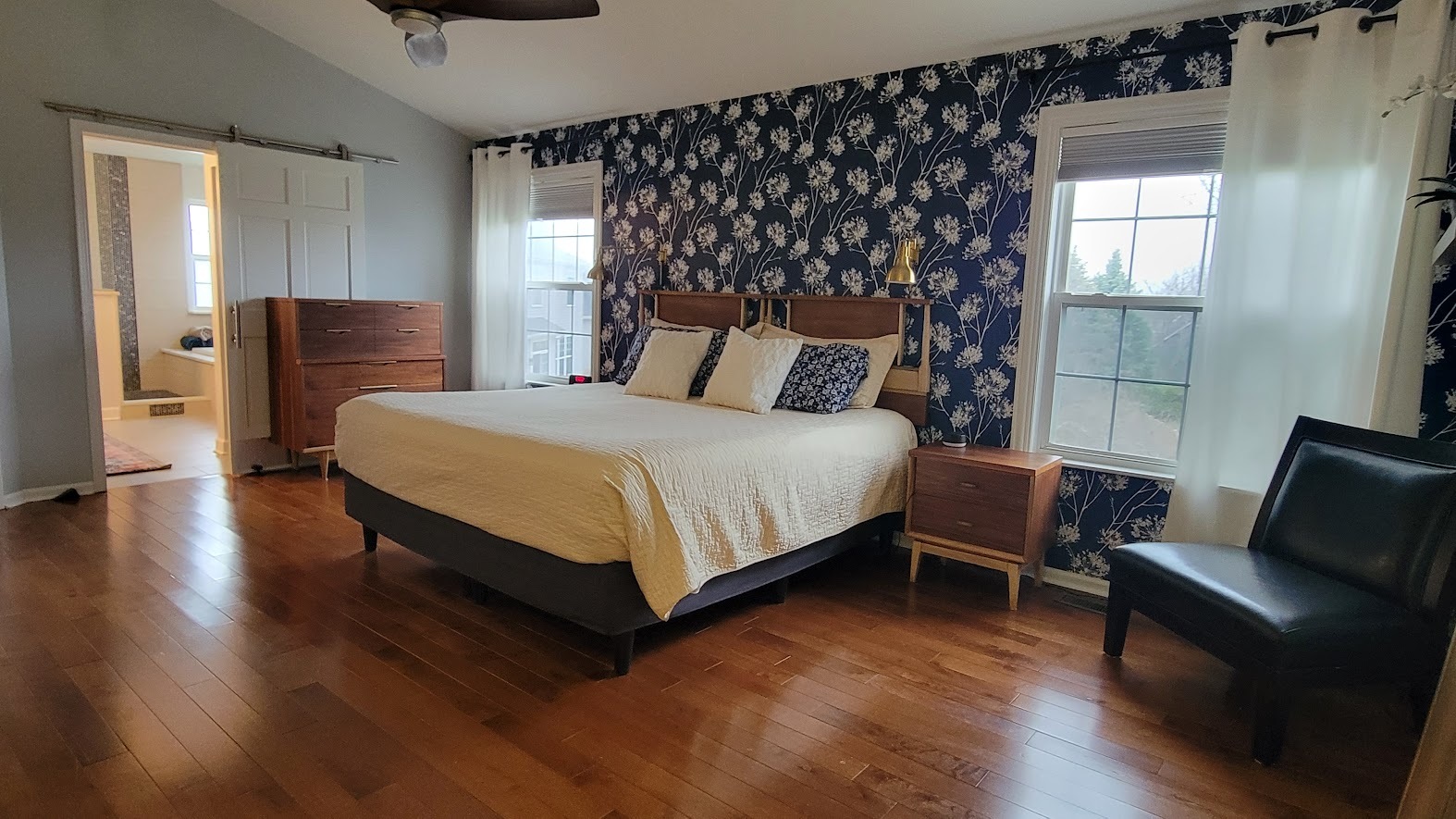 3907 Farmstead Road Carpentersville, IL 60110 - Photo 30 of 49 a bedroom with a bed and wooden floor