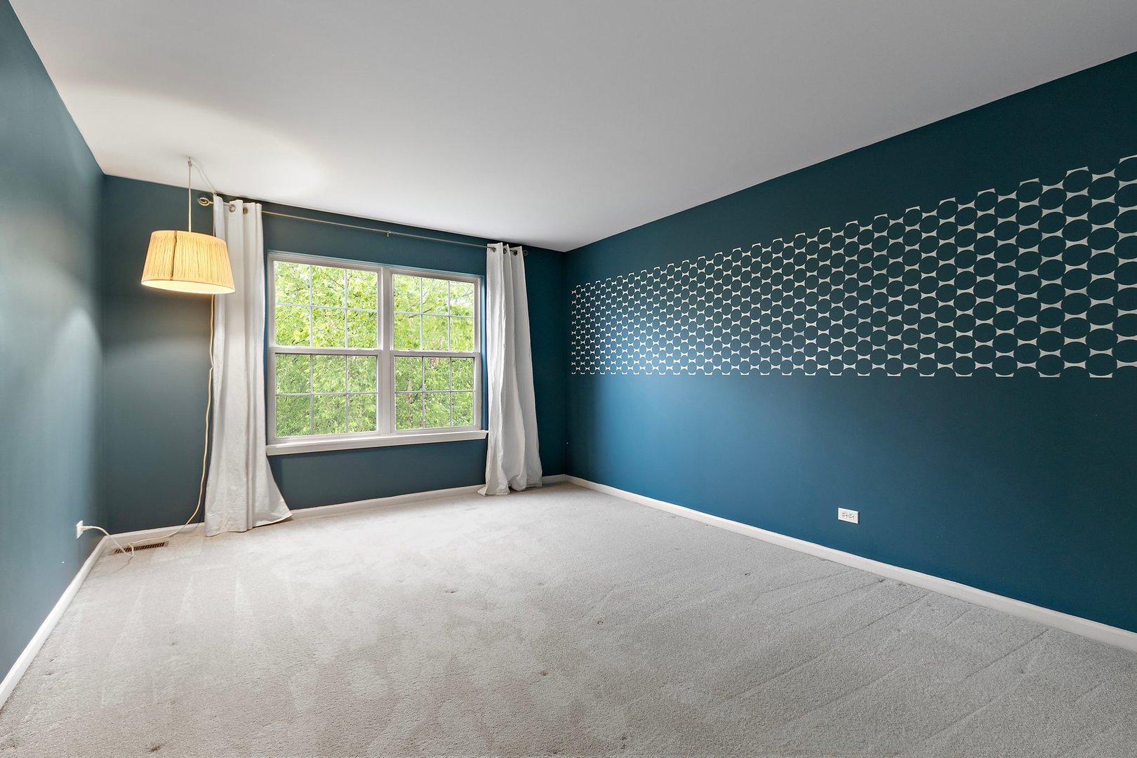 3907 Farmstead Road Carpentersville, IL 60110 - Photo 36 of 49 a view of a livingroom with a ceiling fan and a window