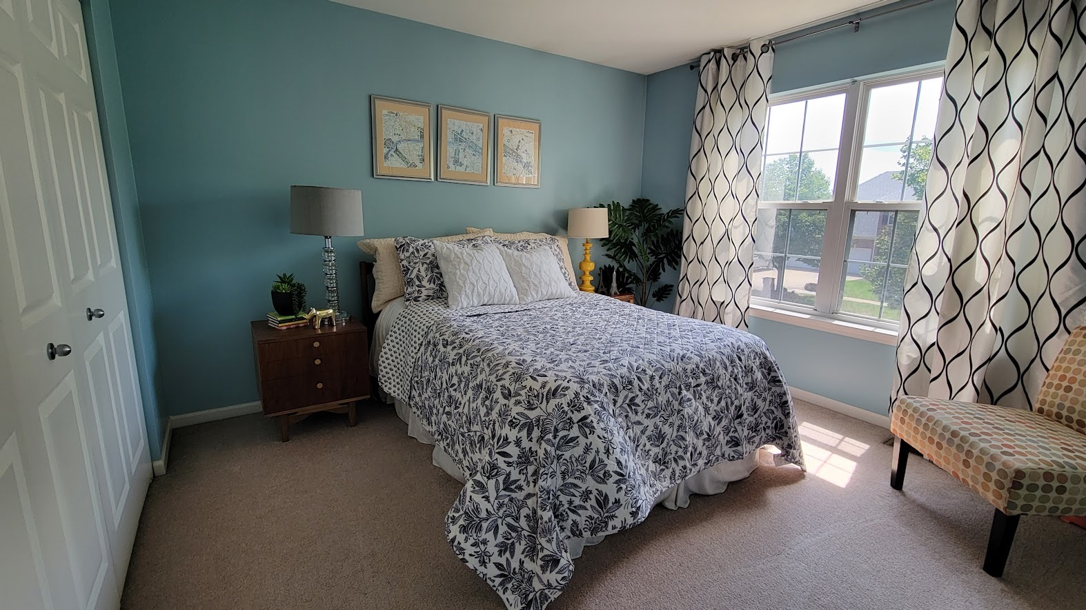 3907 Farmstead Road Carpentersville, IL 60110 - Photo 37 of 49 a bedroom with a bed and a window