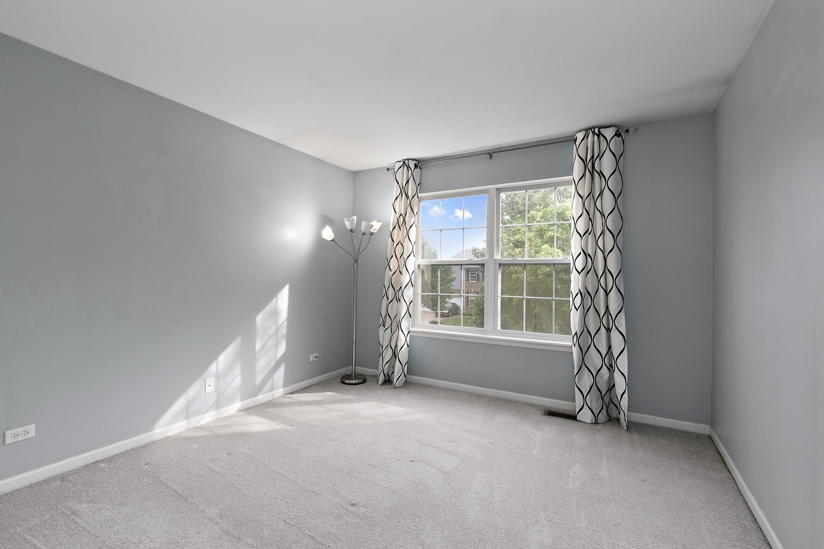 3907 Farmstead Road Carpentersville, IL 60110 - Photo 38 of 49 a view of an empty room with a window