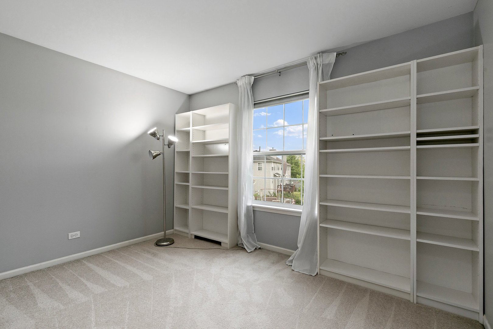 3907 Farmstead Road Carpentersville, IL 60110 - Photo 39 of 49 a view of an empty room with a fireplace
