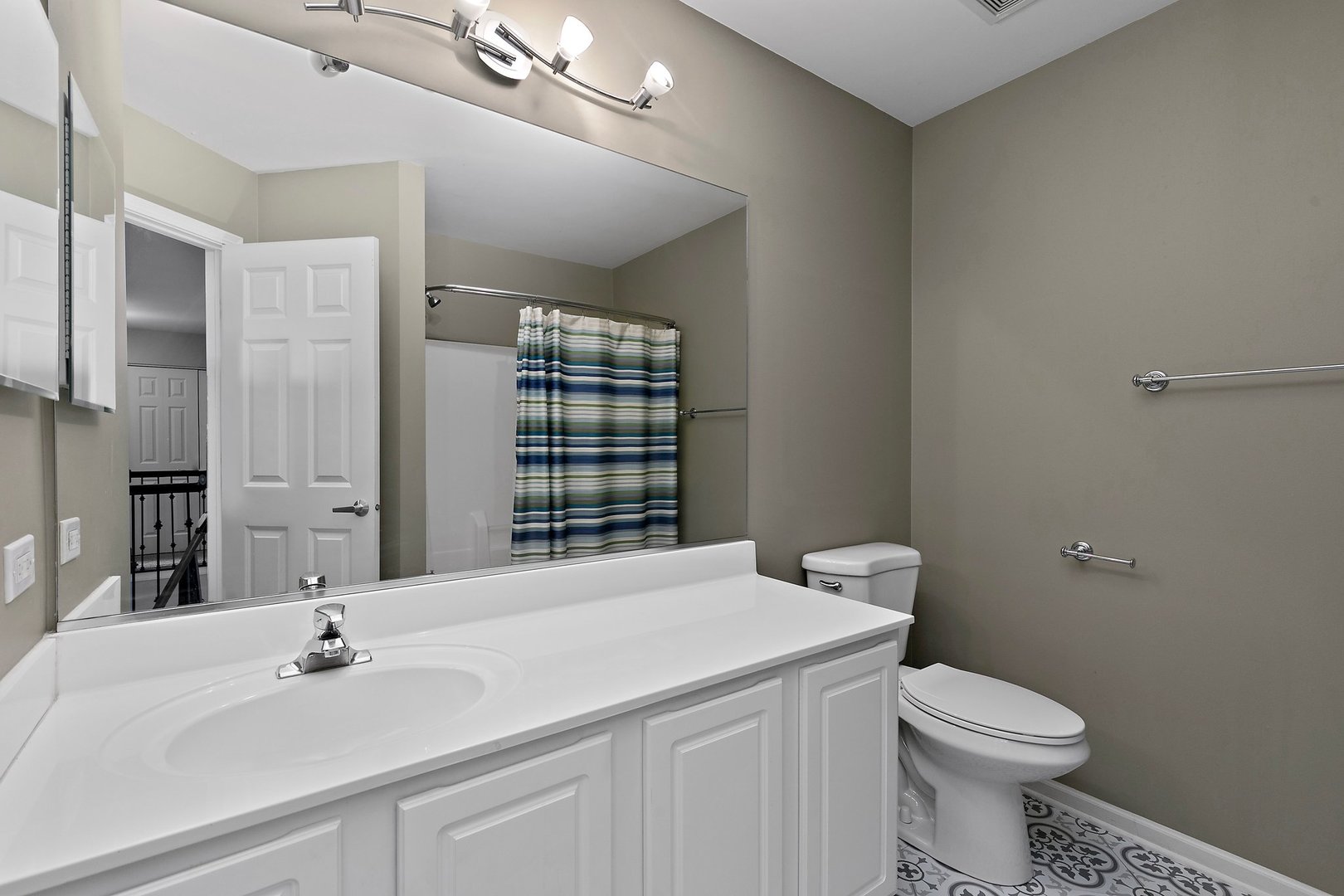 3907 Farmstead Road Carpentersville, IL 60110 - Photo 40 of 49 a bathroom with a sink a toilet and shower