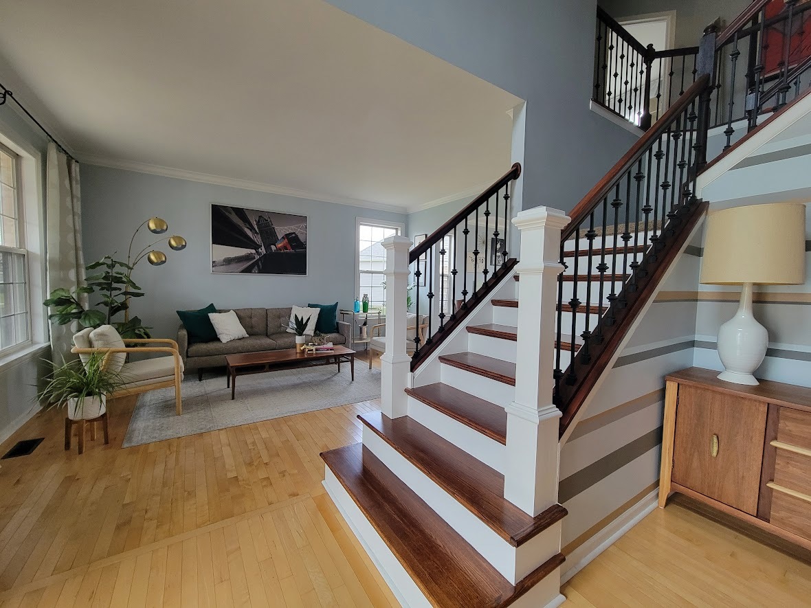 3907 Farmstead Road Carpentersville, IL 60110 - Photo 9 of 49 a living room with furniture and a rug
