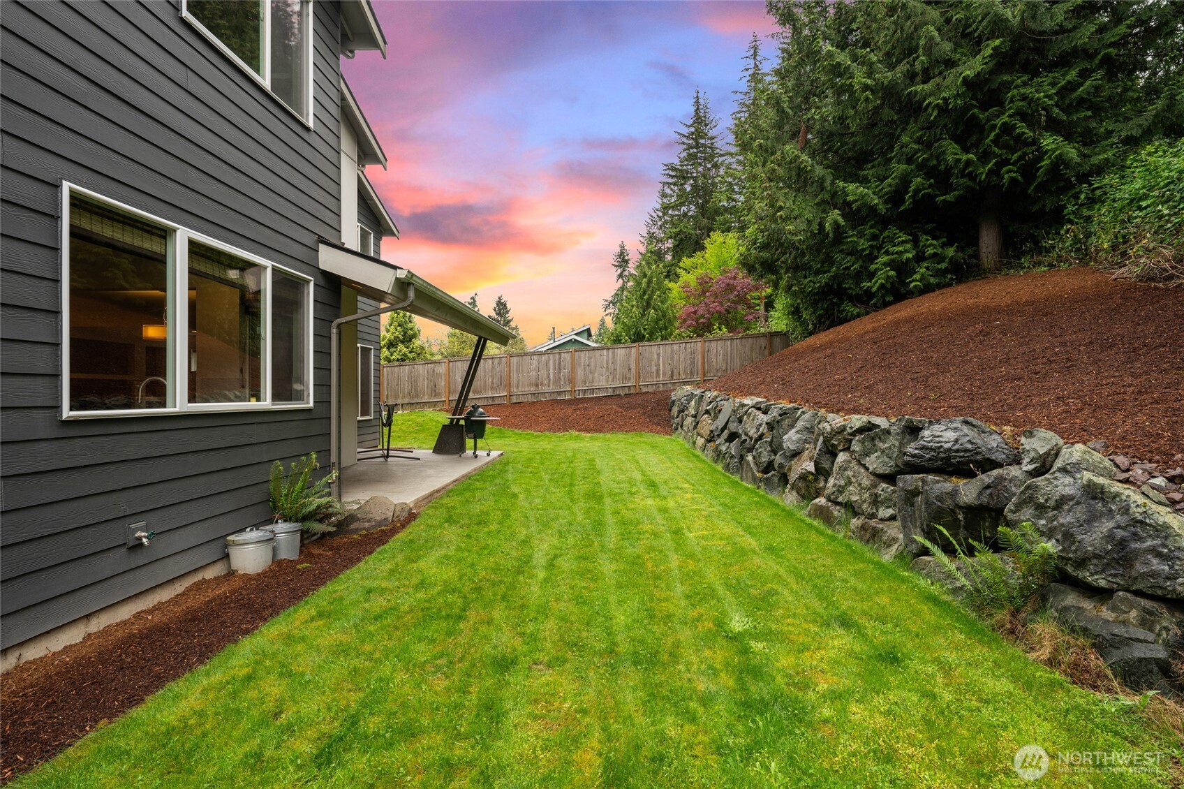 22326 2nd Place Southeast Bothell, WA 98021 - Photo 33 of 40 a view of a backyard with a garden