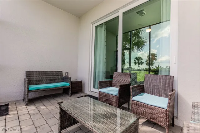 a room with furniture and a window