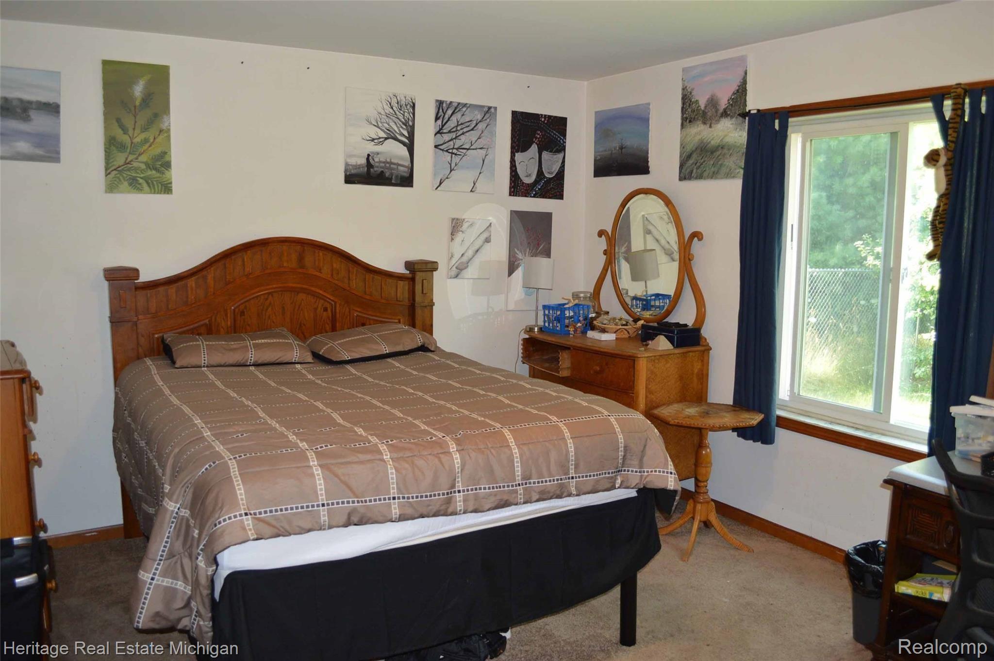 285 North Hughes Road Howell, MI 48843 - Photo 6 of 13 1st floor bedroom