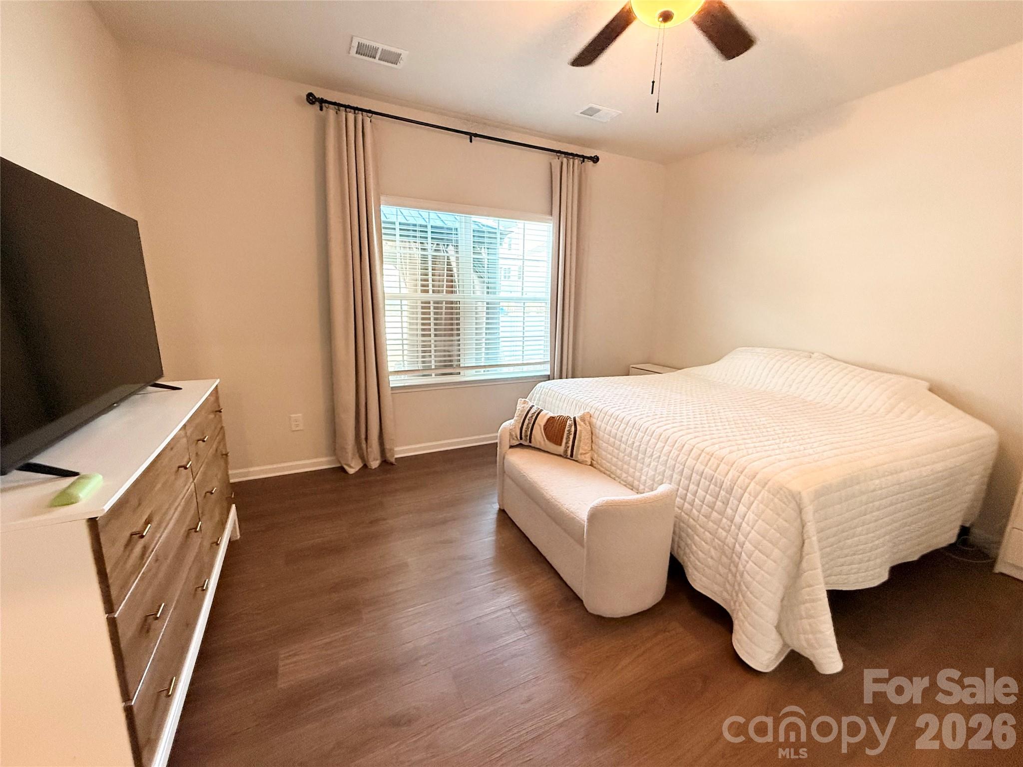 6570 Gopher Road Lancaster, SC 29720 - Photo 12 of 26 a spacious bedroom with a bed and a flat tv screen