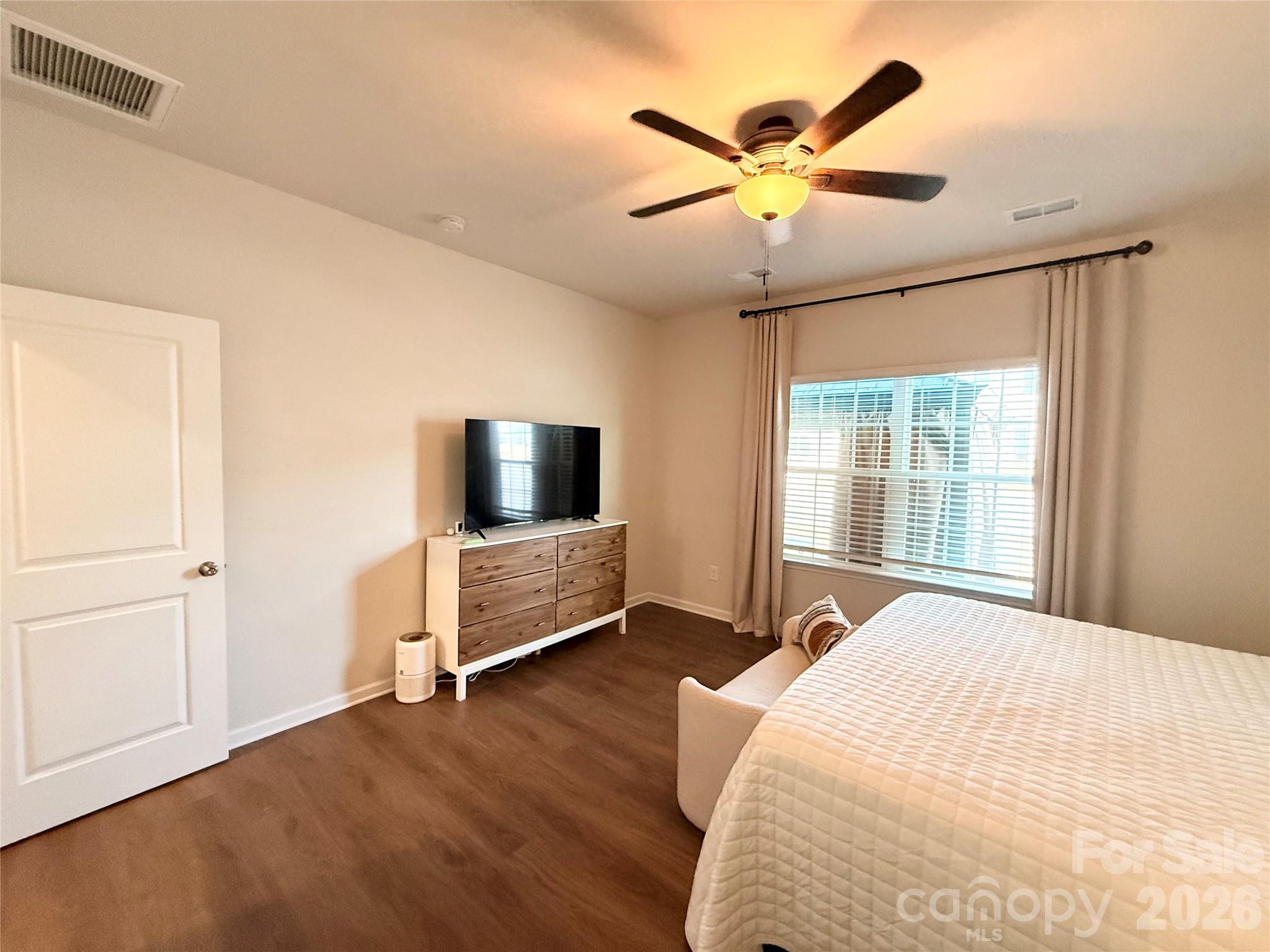 6570 Gopher Road Lancaster, SC 29720 - Photo 13 of 26 a bedroom with a bed and a large window
