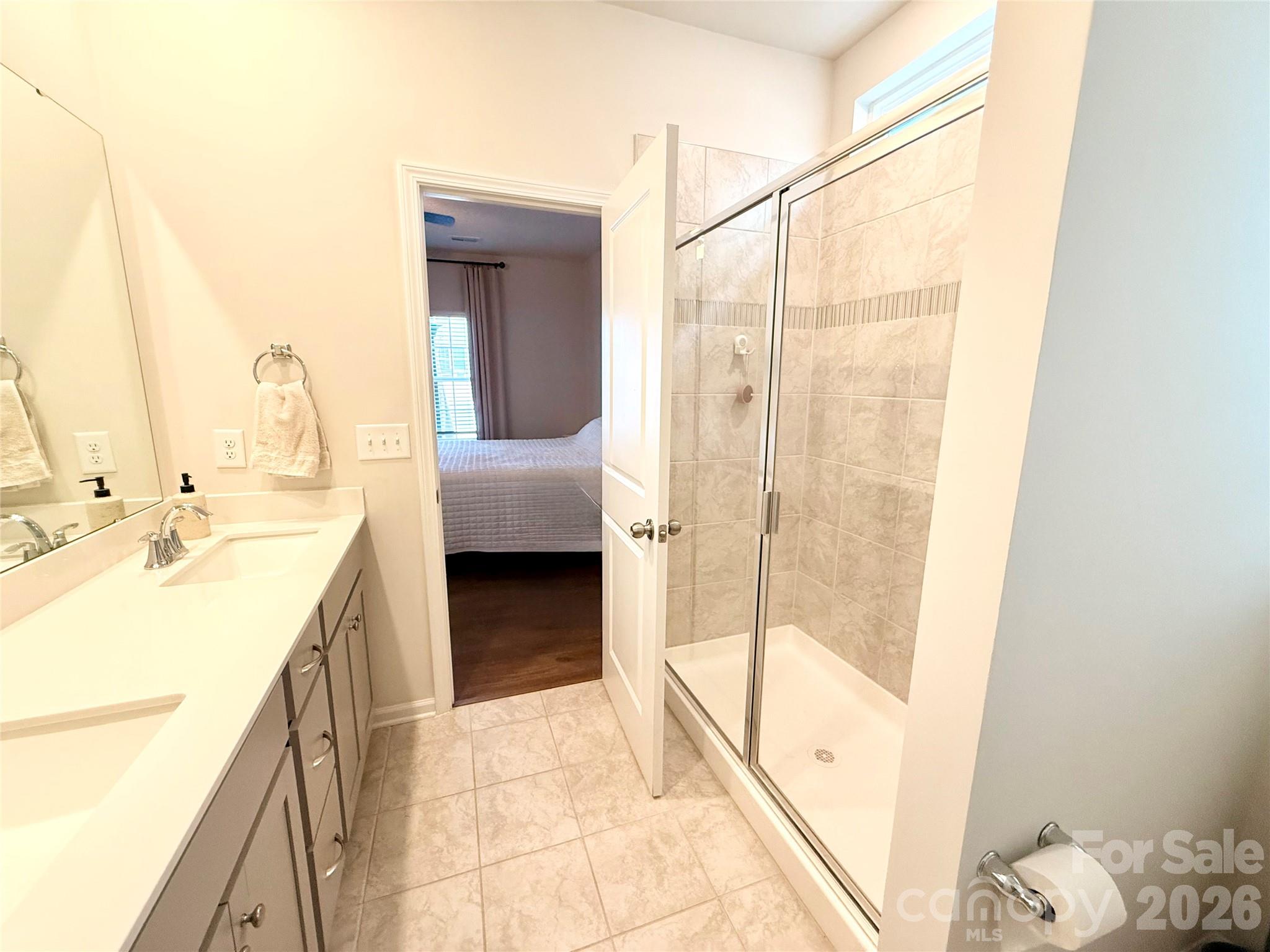 6570 Gopher Road Lancaster, SC 29720 - Photo 14 of 26 a bathroom with a tub sink and a mirror