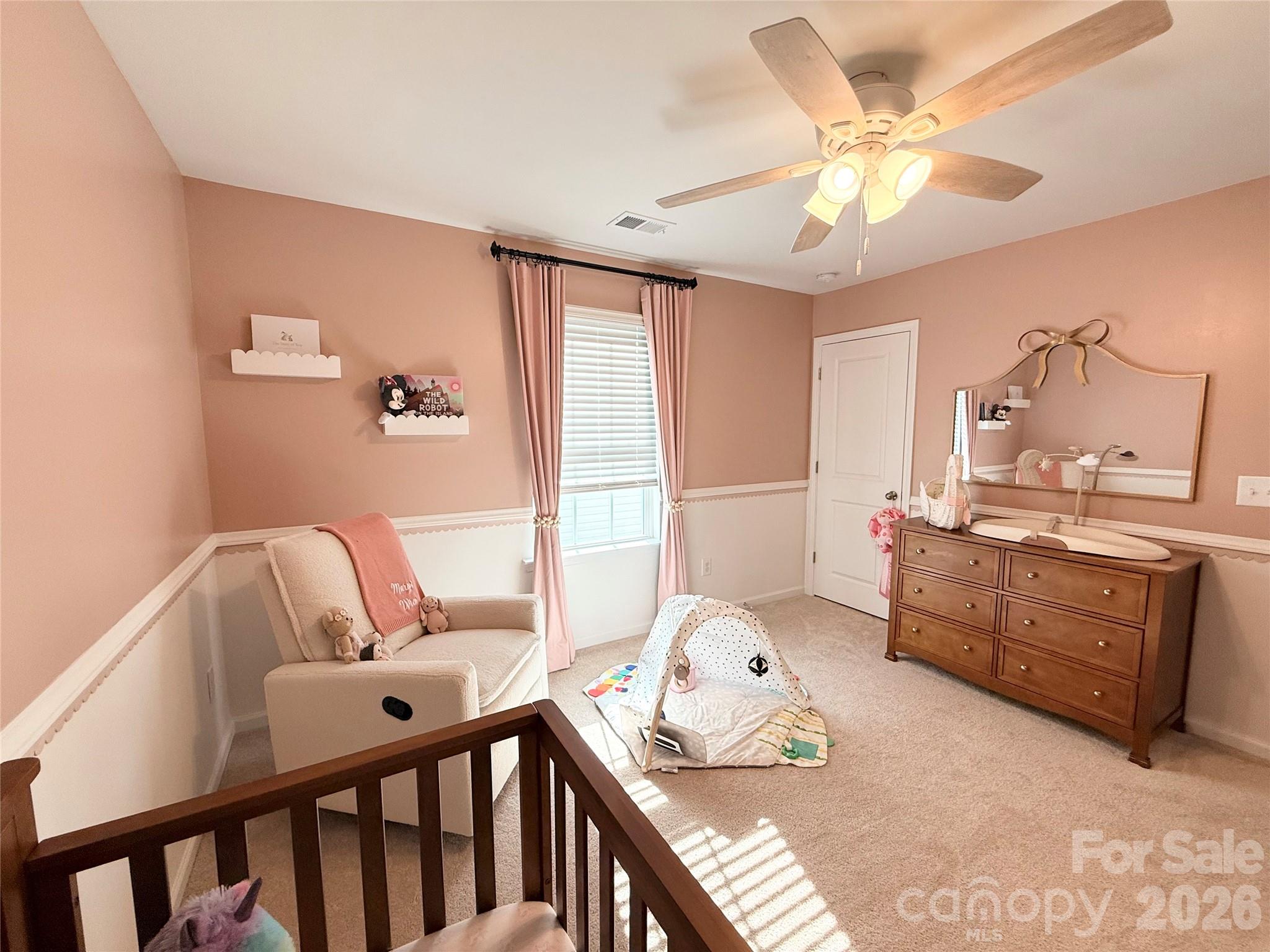6570 Gopher Road Lancaster, SC 29720 - Photo 19 of 26 a bedroom with furniture and wooden floor