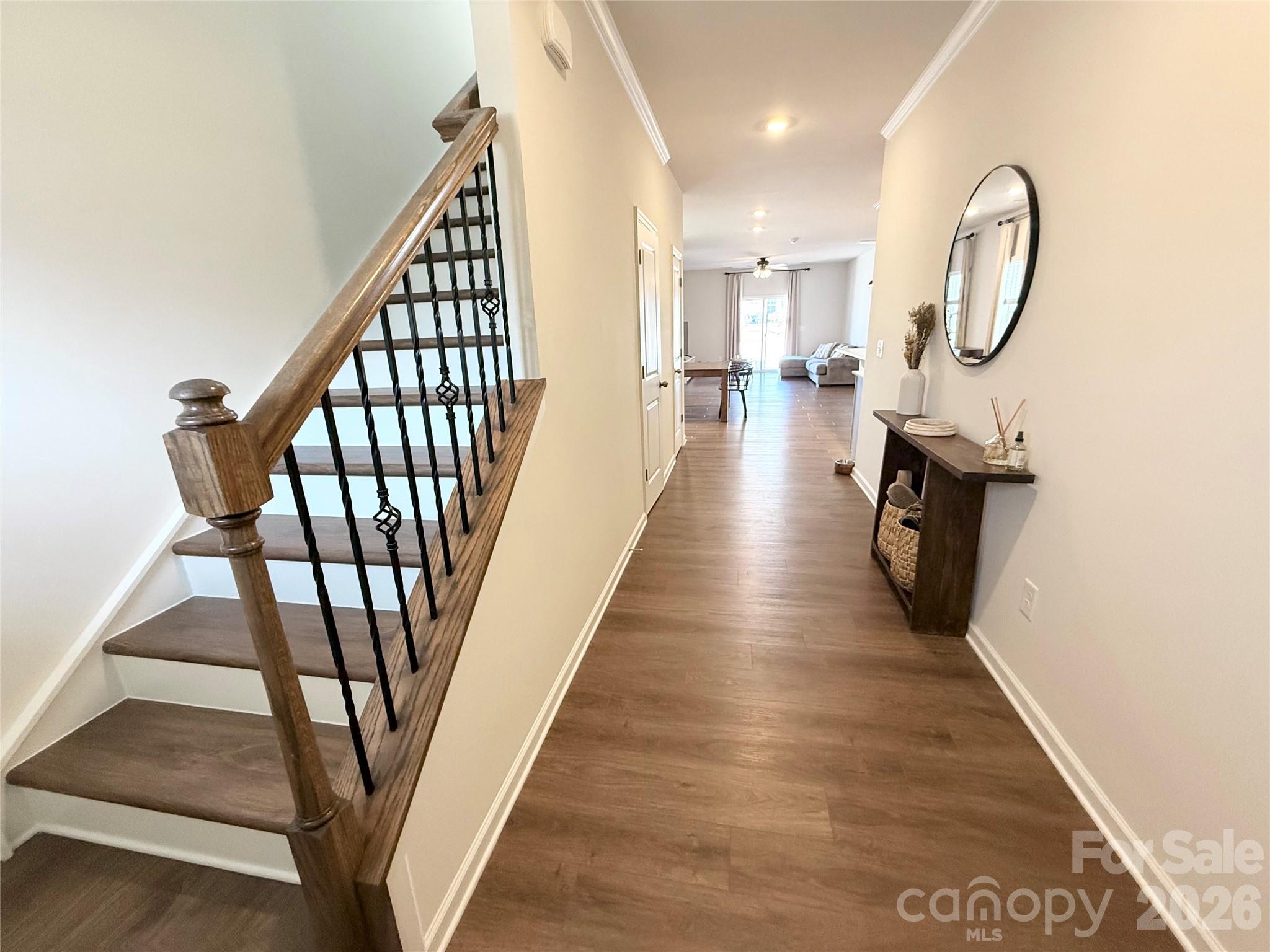 6570 Gopher Road Lancaster, SC 29720 - Photo 2 of 26 a view of a hallway with wooden floor and entryway