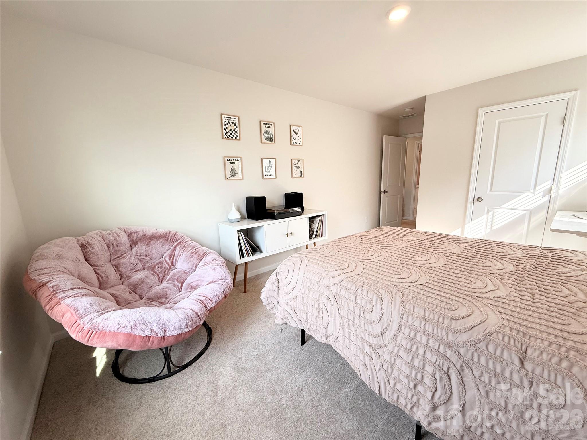 6570 Gopher Road Lancaster, SC 29720 - Photo 22 of 26 a bedroom with a bed and couch