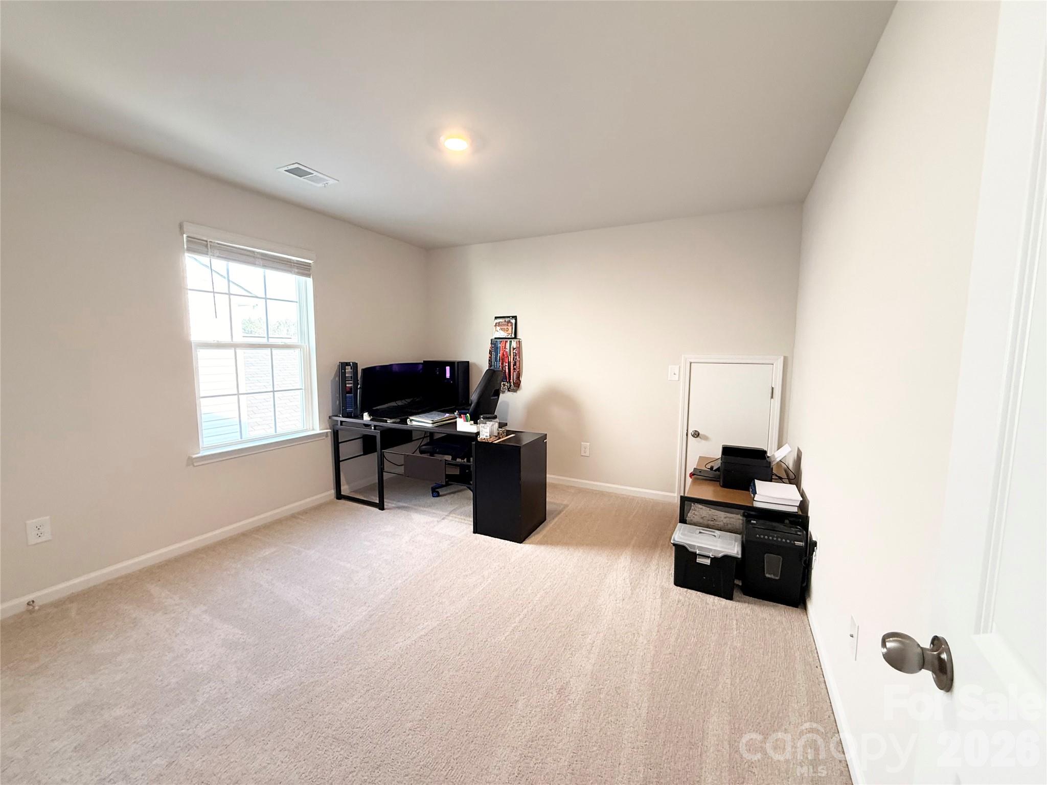 6570 Gopher Road Lancaster, SC 29720 - Photo 24 of 26 a living room with furniture and a flat screen tv