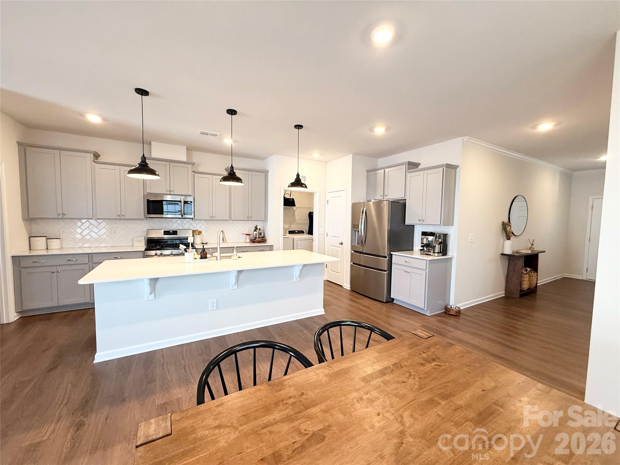 6570 Gopher Road Lancaster, SC 29720 - Photo 6 of 26 a kitchen with counter top space cabinets and stainless steel appliances