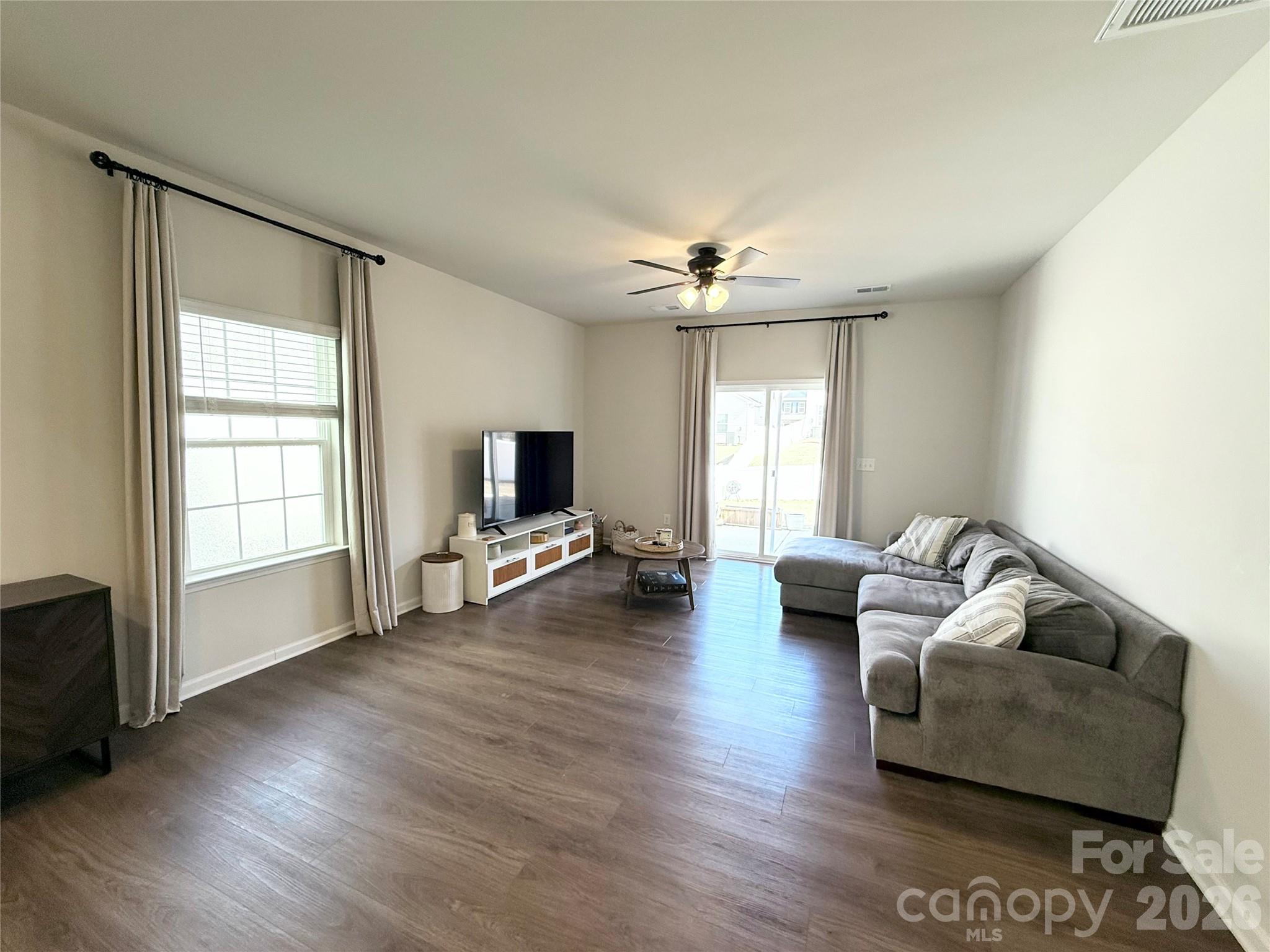 6570 Gopher Road Lancaster, SC 29720 - Photo 10 of 26 a living room with furniture and a flat screen tv