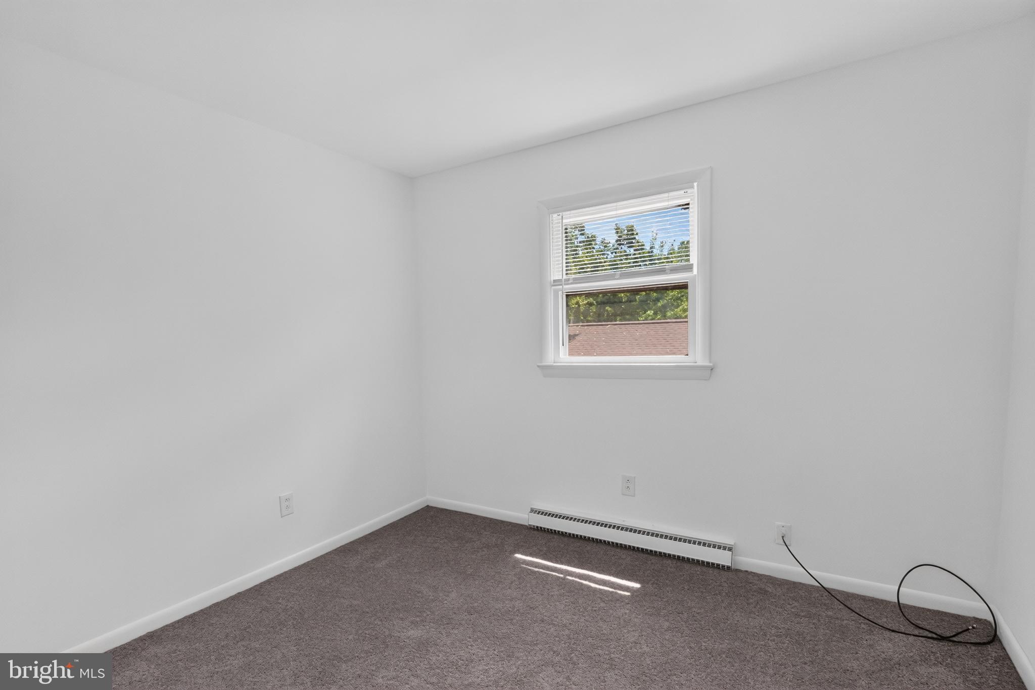 351 Calvert Street Chestertown, MD 21620 - Photo 11 of 19 an empty room with a window