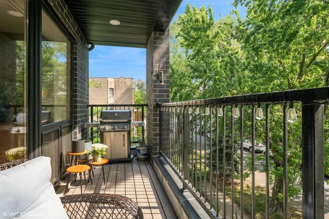 a view of a garage with cars