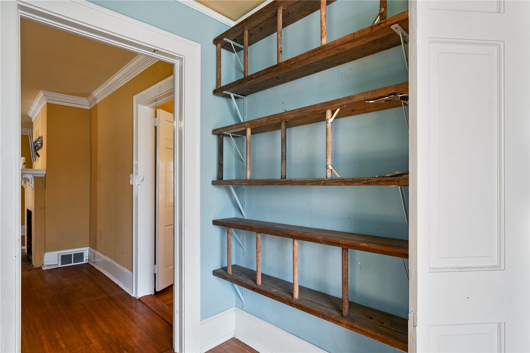 2307 North Avenue Anderson, SC 29625 - Photo 12 of 49 This interior hallway features wood floors and built-in shelving, ready for your personal touch.