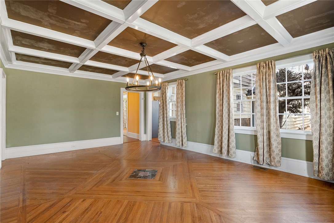 2307 North Avenue Anderson, SC 29625 - Photo 14 of 49 This elegant space showcases a stunning coffered ceiling and beautiful hardwood flooring.