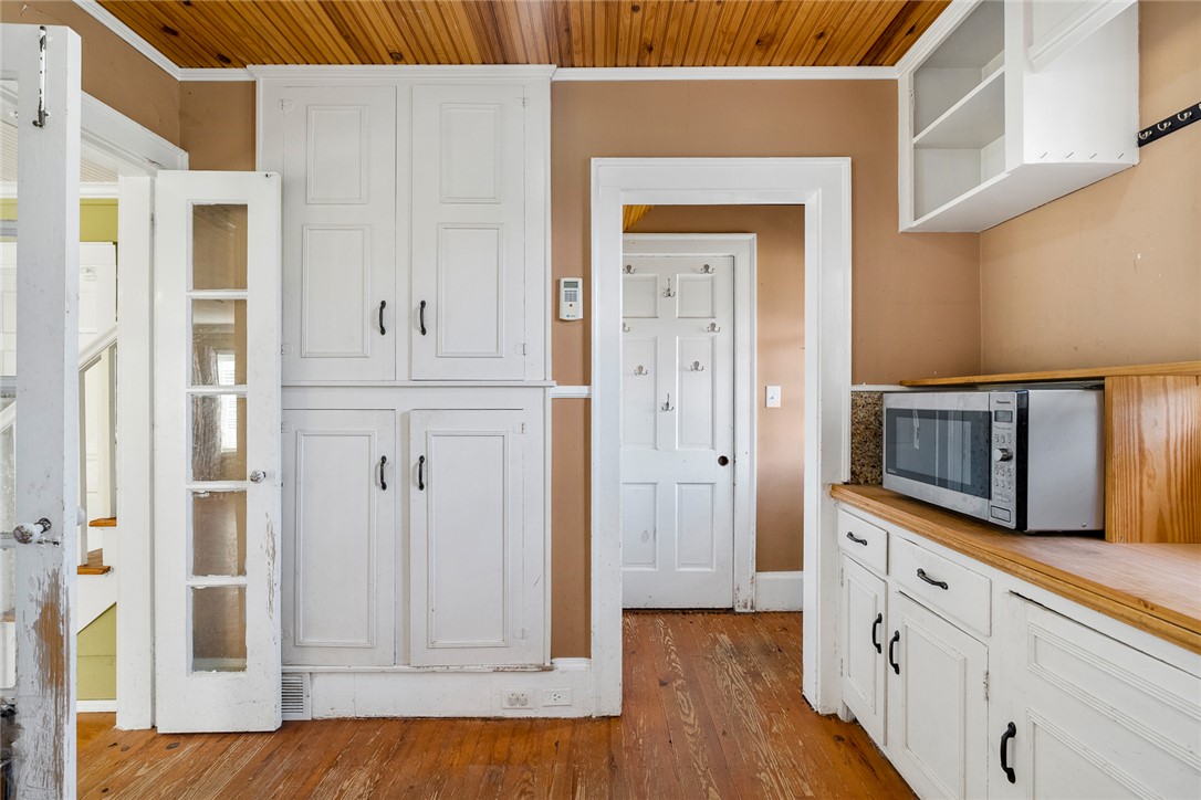 2307 North Avenue Anderson, SC 29625 - Photo 25 of 49 This cozy kitchen features classic wooden floors and ample storage, perfect for culinary endeavors.