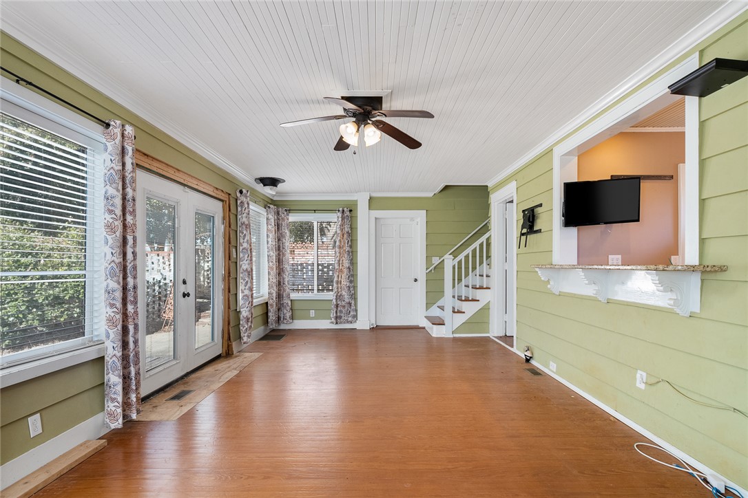 2307 North Avenue Anderson, SC 29625 - Photo 28 of 49 This bright sunroom offers a harmonious blend of indoor comfort and outdoor access, perfect for relaxation.