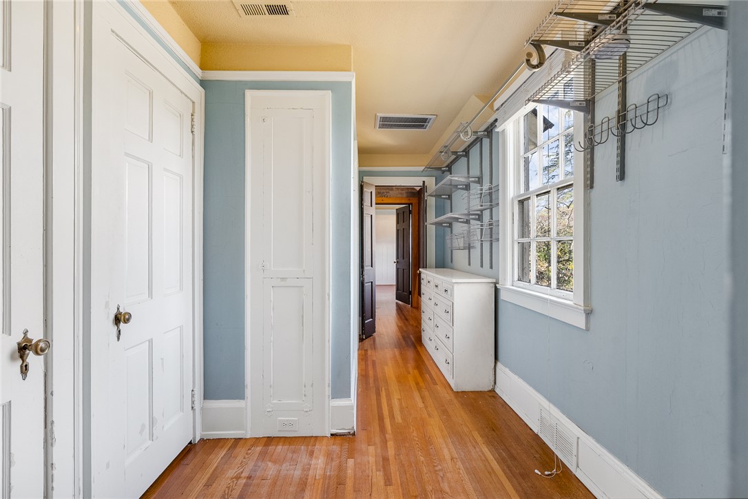 2307 North Avenue Anderson, SC 29625 - Photo 40 of 49 This spacious closet offers ample storage with convenient shelving and charming hardwood flooring.