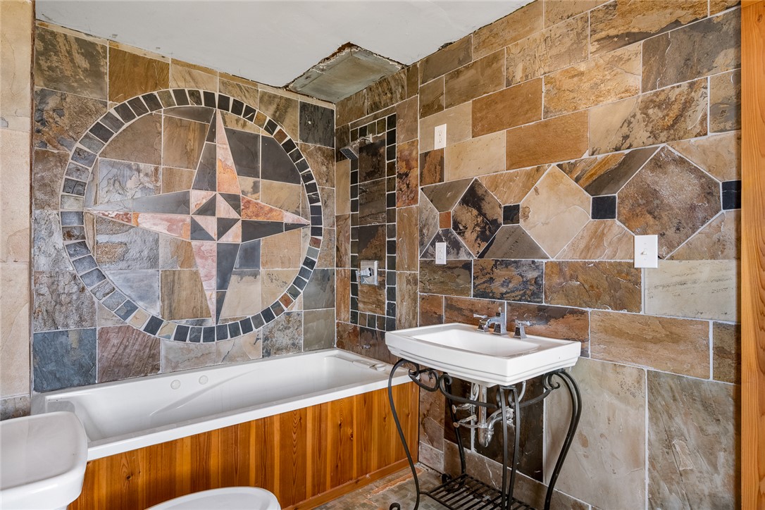 2307 North Avenue Anderson, SC 29625 - Photo 45 of 49 This bathroom features unique tile work, creating a distinctive and inviting space.