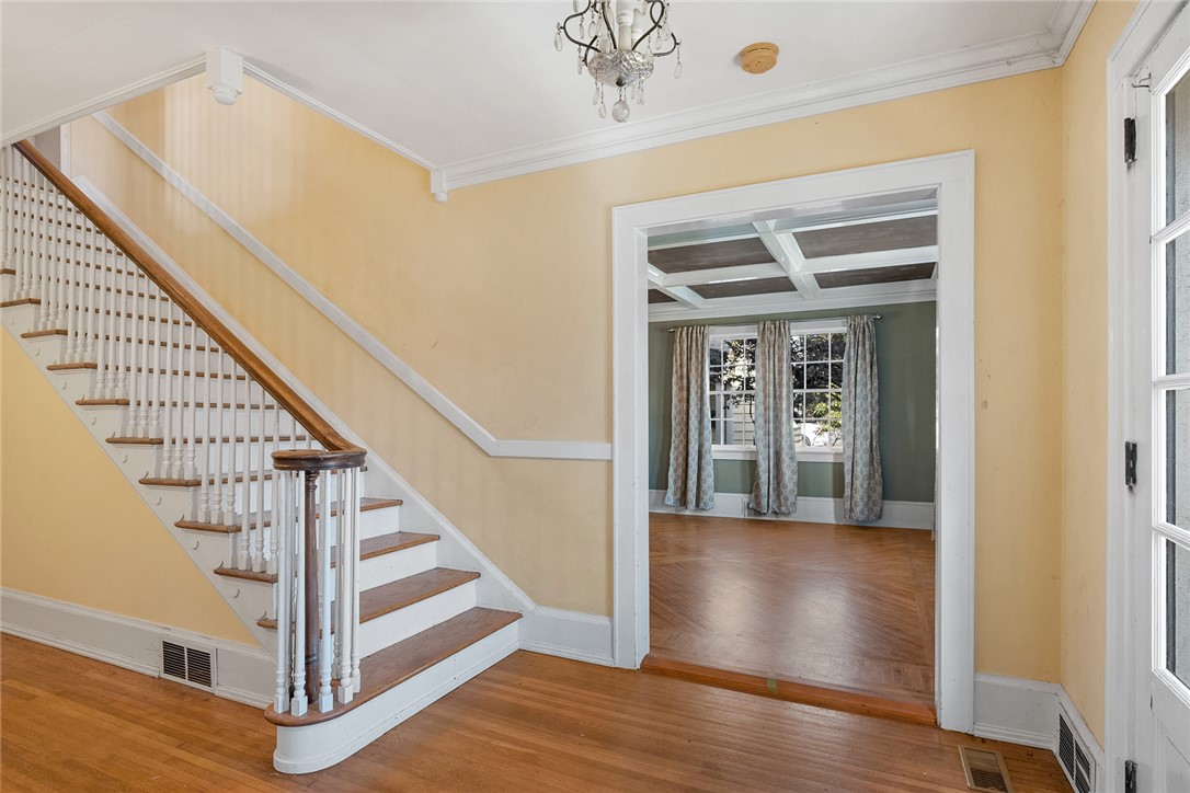 2307 North Avenue Anderson, SC 29625 - Photo 5 of 49 This inviting entryway showcases a beautiful staircase and polished hardwood flooring.
