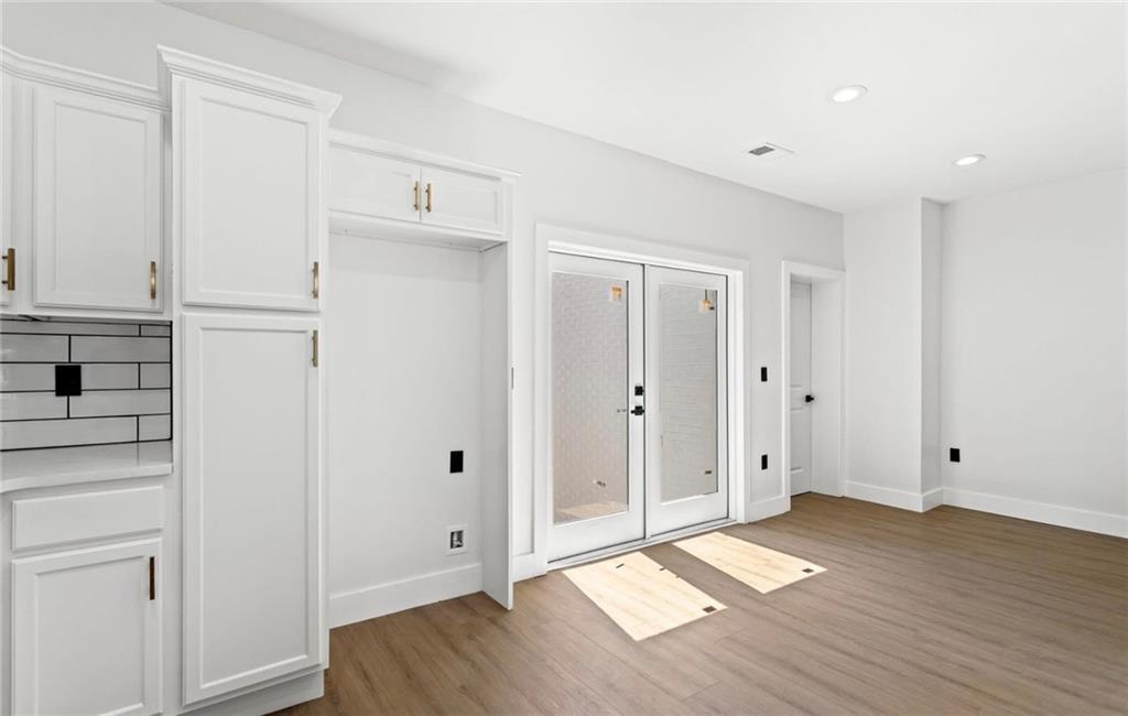 525 Medlock Road Decatur, GA 30030 - Photo 14 of 50 a view of empty room with wooden floor