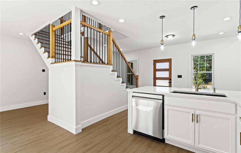 525 Medlock Road Decatur, GA 30030 - Photo 15 of 50 a view of a hallway with entryway and wooden floor