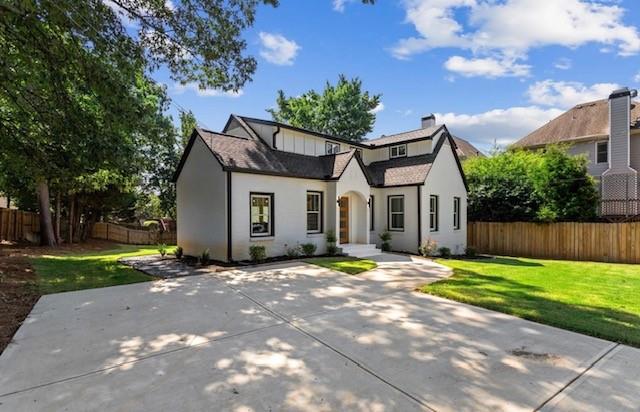 525 Medlock Road Decatur, GA 30030 - Photo 2 of 50 a front view of a house with a yard and garage
